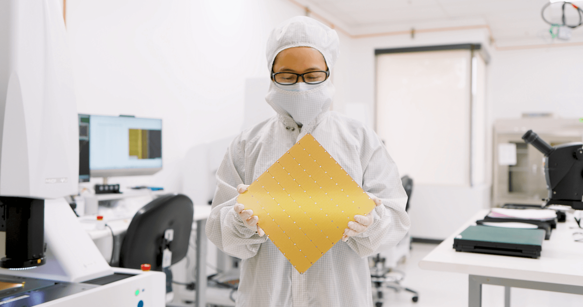 Cerebras Wafer-Scale Engine held in a cleanroom